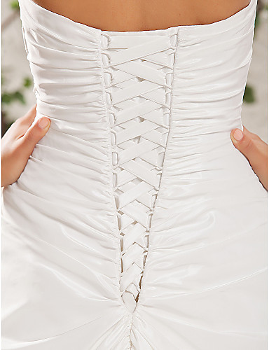 На что обратить внимание при покупке свадебного платья - фото 2